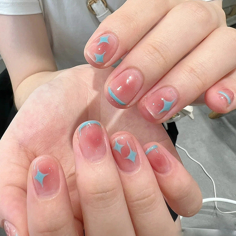 Starry Charm Short Round Pink Press On Nails with Blue Accents and Glitter Stars