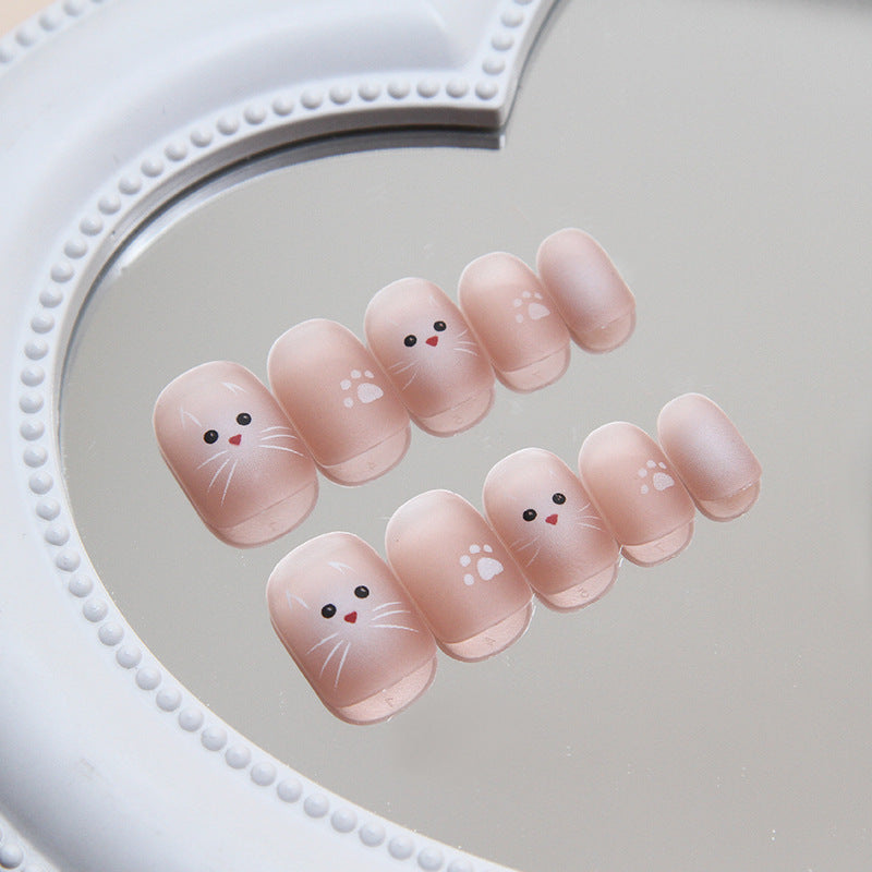 Whimsical Bunny Craze Short Round Peach Press On Nail Set with Adorable Face Art Detail