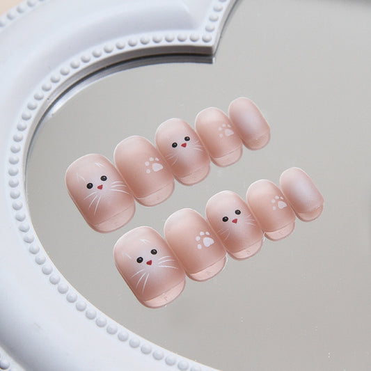 Whimsical Bunny Craze Short Round Peach Press On Nail Set with Adorable Face Art Detail