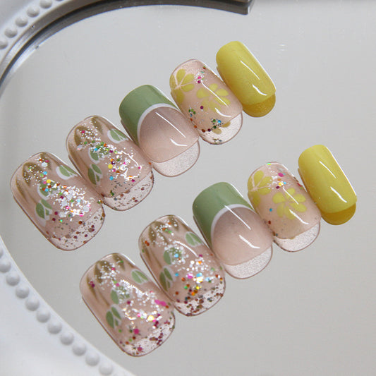 Spring Garden Charm Short Round Glitter Press On Nail Set in Pastel Green Pink and Yellow with Floral Nail Art Design