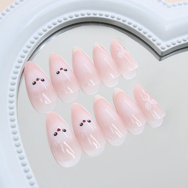 Whimsical Pastel Long Almond Shaped Pink Press on Nail Set with Adorable Cartoon Faces