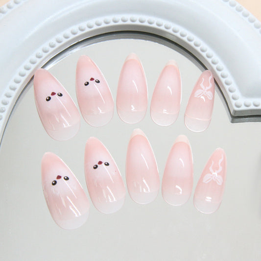 Whimsical Charm Long Almond Pink Nail Set with Cute Face and Elegant Bow Design