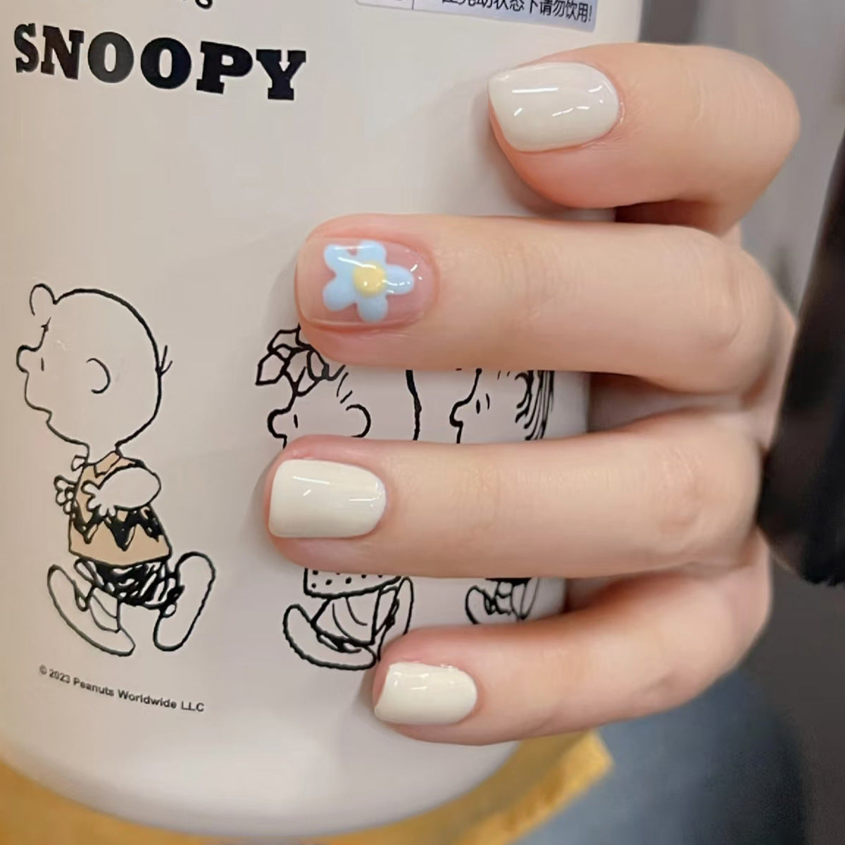 Whimsical Floral Fantasy Short Square Soft Cream with Charming Blue Flower Accent Press On Nail Set