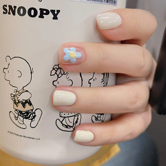 Whimsical Floral Fantasy Short Square Soft Cream with Charming Blue Flower Accent Press On Nail Set