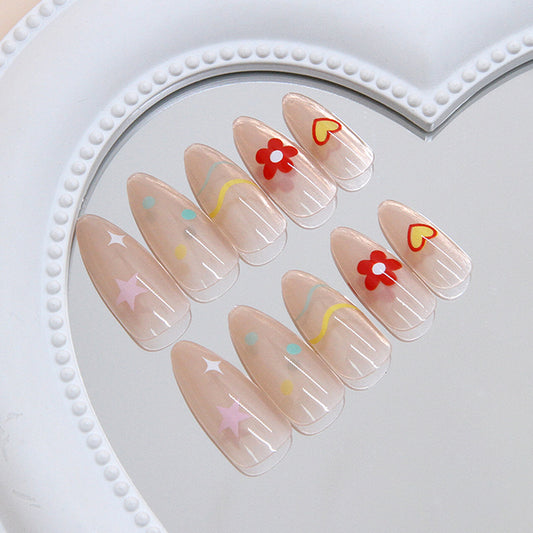 Whimsical Garden Inspired Long Almond Shaped Soft Pink Press on Nails with Cute Floral and Heart Decorations