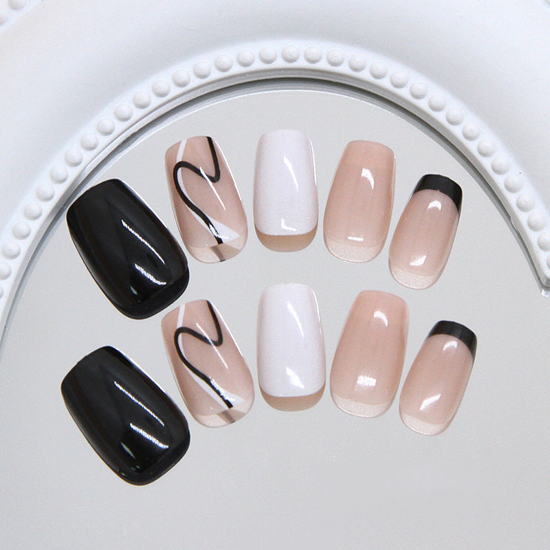 Chic Minimalist Elegance Medium Coffin Glossy Black and White Press On Nail Set with Artistic Line Design