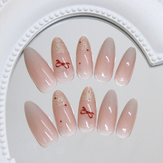 Charming Elegance Long Almond Blush Pink Press On Nail Set with Glitter Accent and Bow Detailing