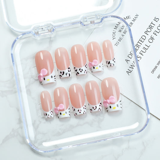 Charming Hello Kitty Inspired Medium Length Square Shaped Soft Pink Nail Set With Unique Bow And Pattern Design