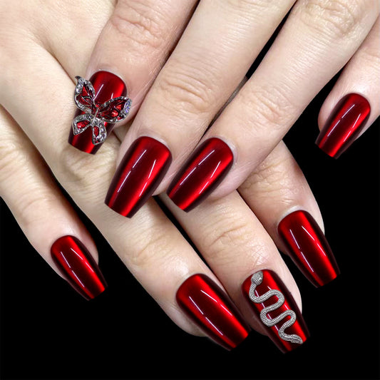 Enchanted Elegance Medium Coffin Red Nails with Metallic Shine and Unique Snake Design