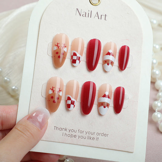 Festive Holiday Short Stiletto Red and Beige Nail Set with Whimsical Christmas Designs
