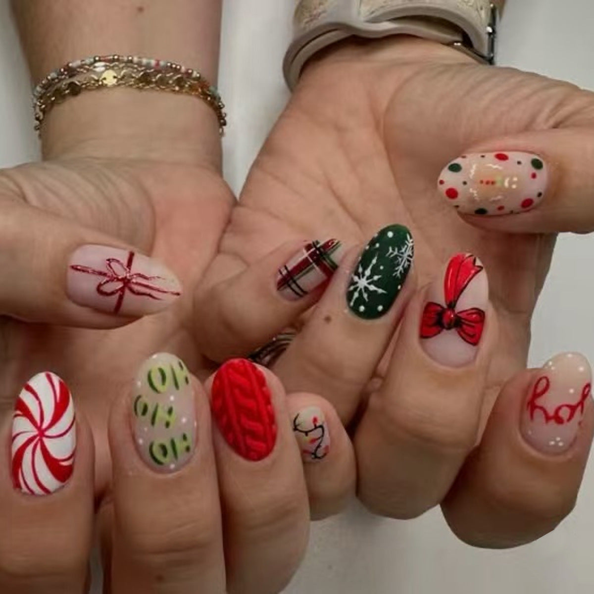 Festive Elegance Medium Oval Red and Green with Unique Holiday Themed Designs Press-On Nail Set