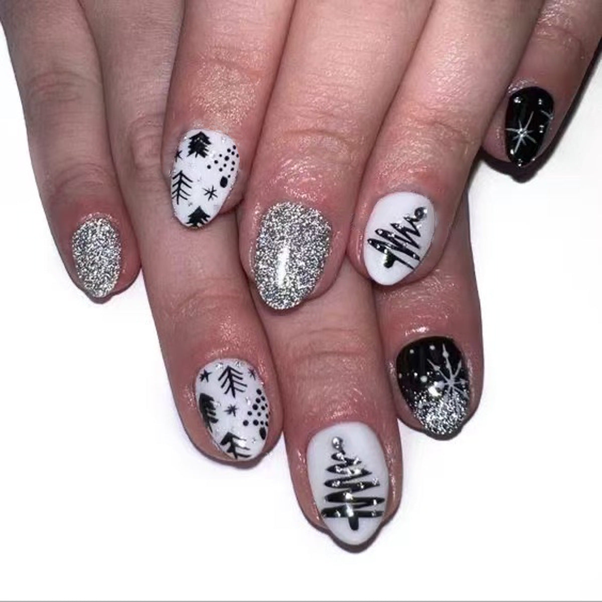 Winter Wonderland Short Oval Shaped Press On Nail Set in Elegant Black and White with Glittery Snowflake Designs