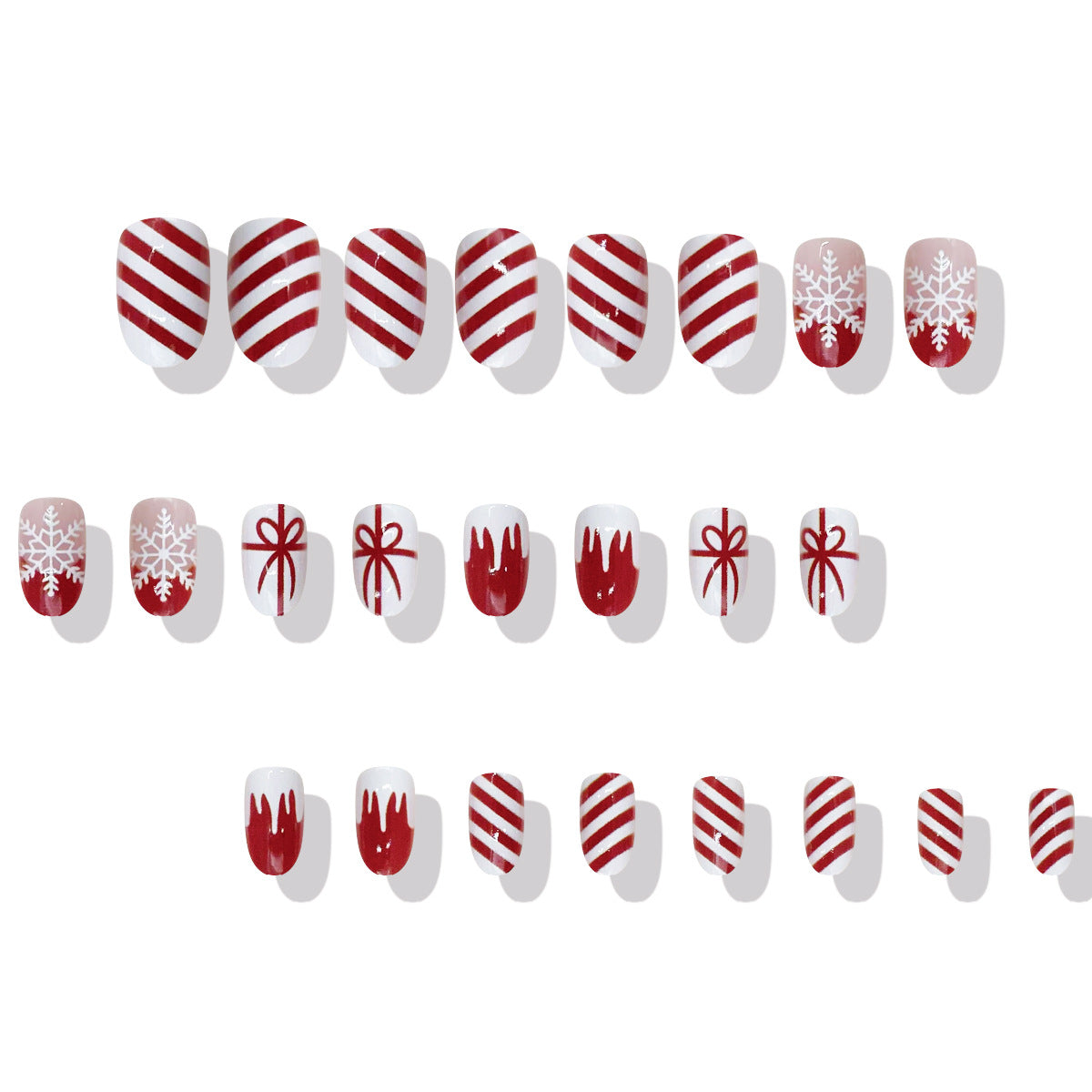 Festive Wonderland Medium Oval Red and White Holiday Design with Snowflakes and Candy Canes Press On Nail Set