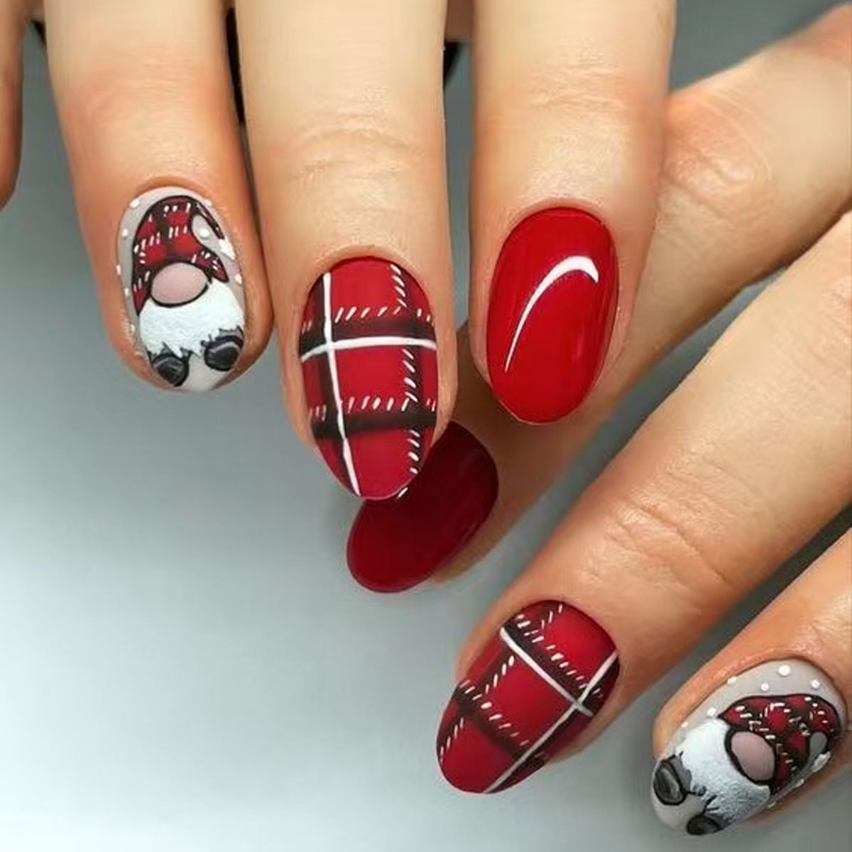Festive Charm Red Medium Oval Shaped Nail Set Featuring Playful Santa Designs