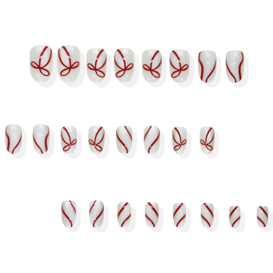 Whimsical Winter Wonderland Medium Oval White with Red Ribbon Detail Press-On Nail Set