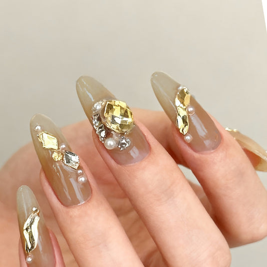 Glamorous Elegance Long Almond Glossy Beige Press on Nail Set with Elegant Gemstone Accents