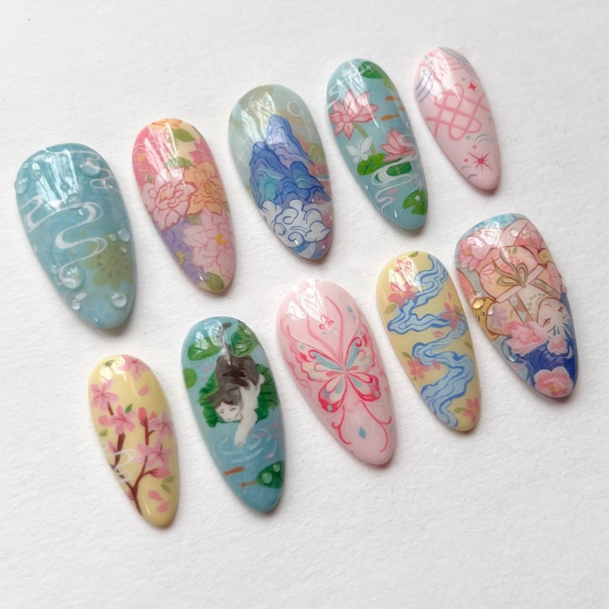 Enchanting Floral Medium Almond Pastel Press On Nail Set Featuring Exquisite Hand-Painted Designs