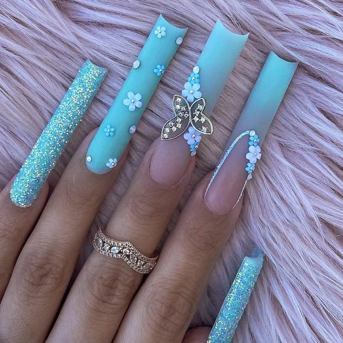 Serene Sky Long Duck Light Blue Press On Nail Set with Glitter, Floral, and Butterfly Accents