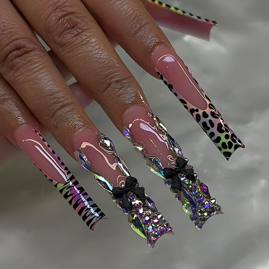 Glamorous Jungle Inspired Long Square Pink Press On Nail Set with Colorful Glitter and Unique Bow Accents