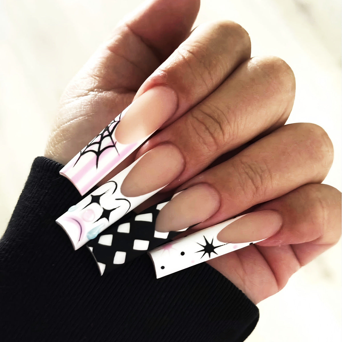 Spooky Chic Long Square Press On Nail Set in Pink and White with Eye-Catching Spider Web and Geometric Designs