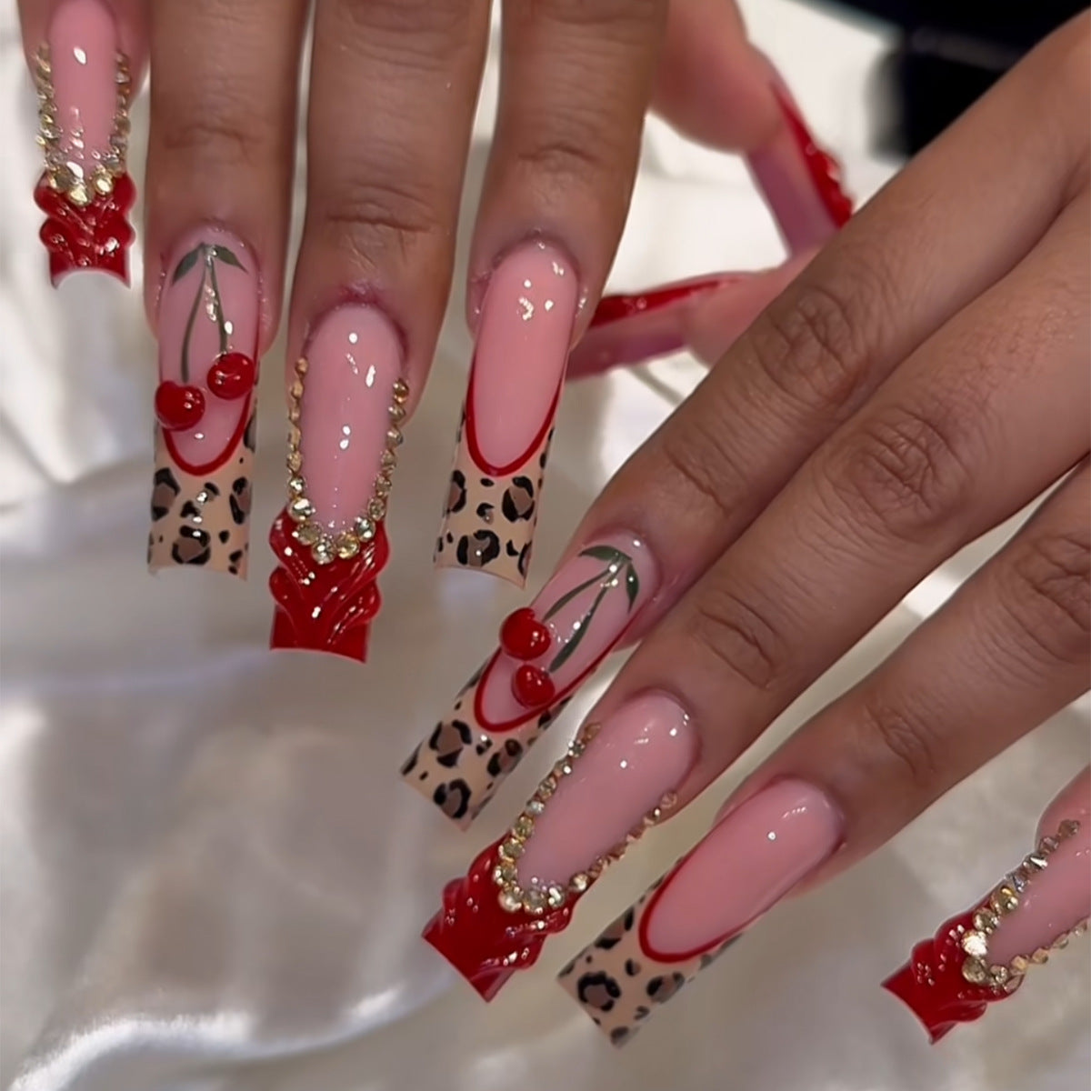 Chic Wildflower Extravaganza Long Square Pink and Red Leopard Design with Cherry Accents and Gold Detailing Press On Nail Set