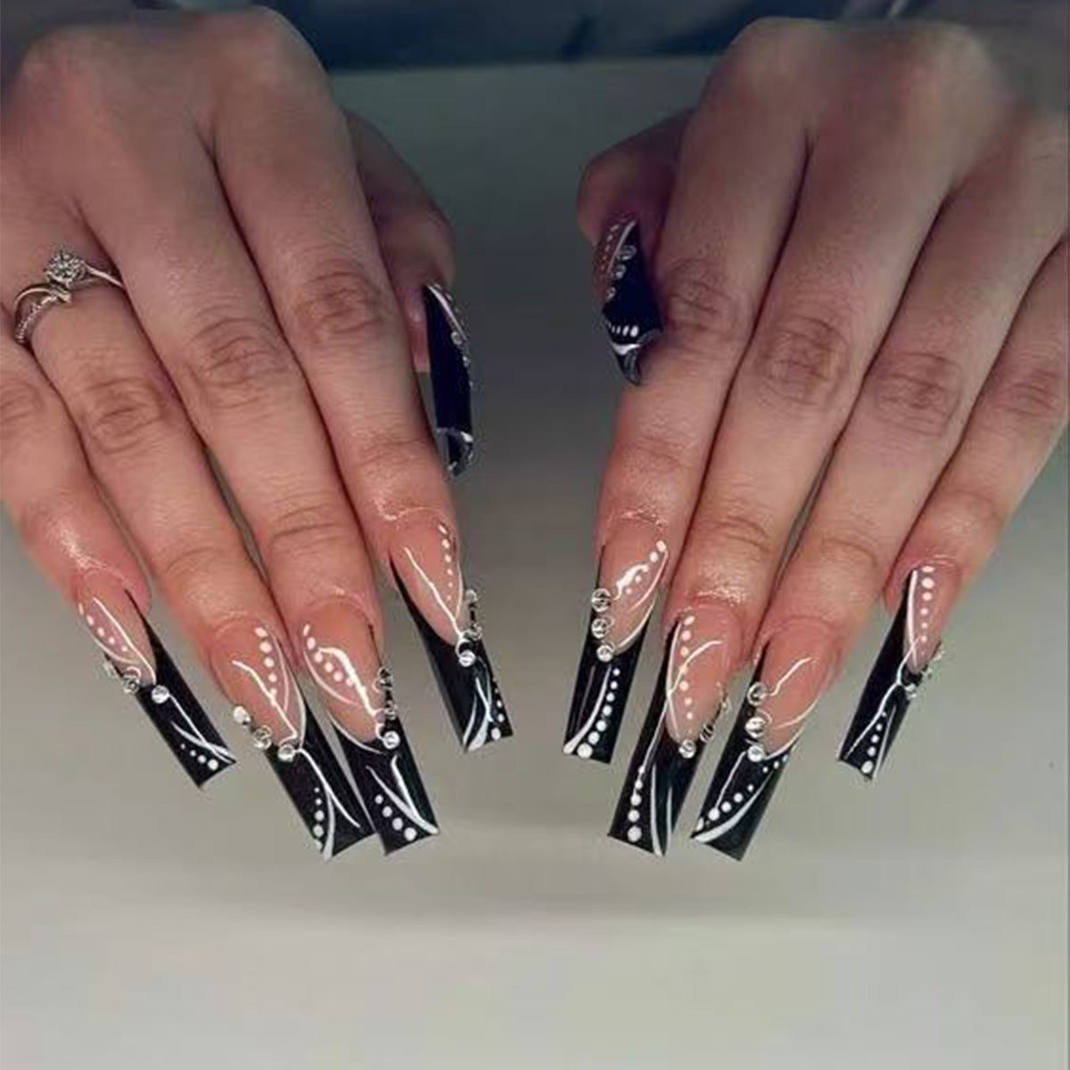 Gothic Elegance Long Square Black Nail Set with Intricate White Designs and Sparkling Accents
