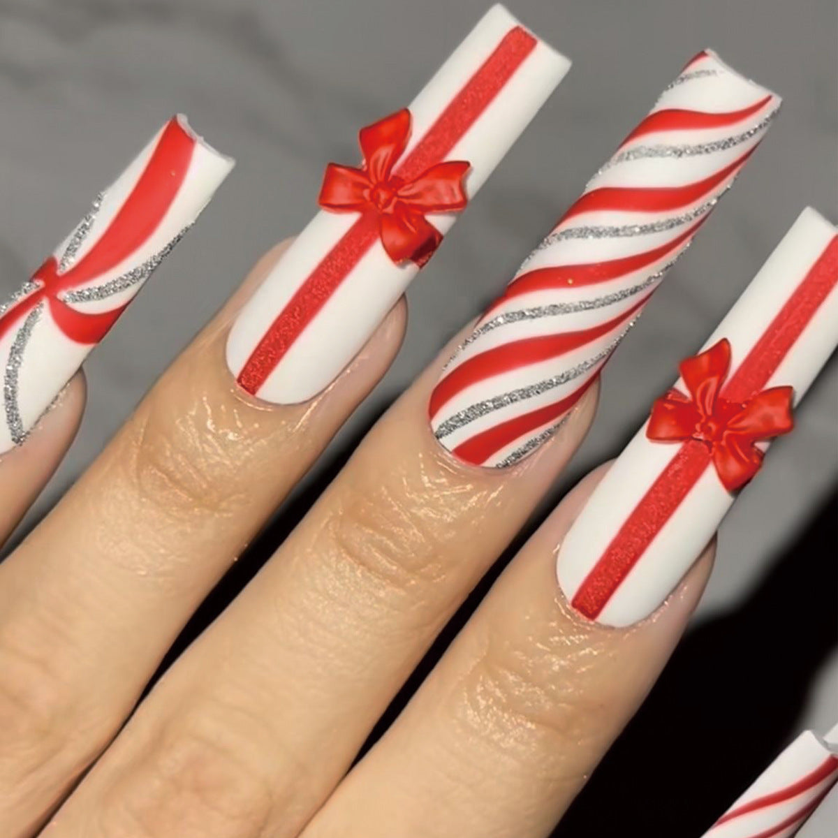 Festive Glamour Long Square Bold Red and White Candy Cane Design with Decorative Bows Press on Nail Set