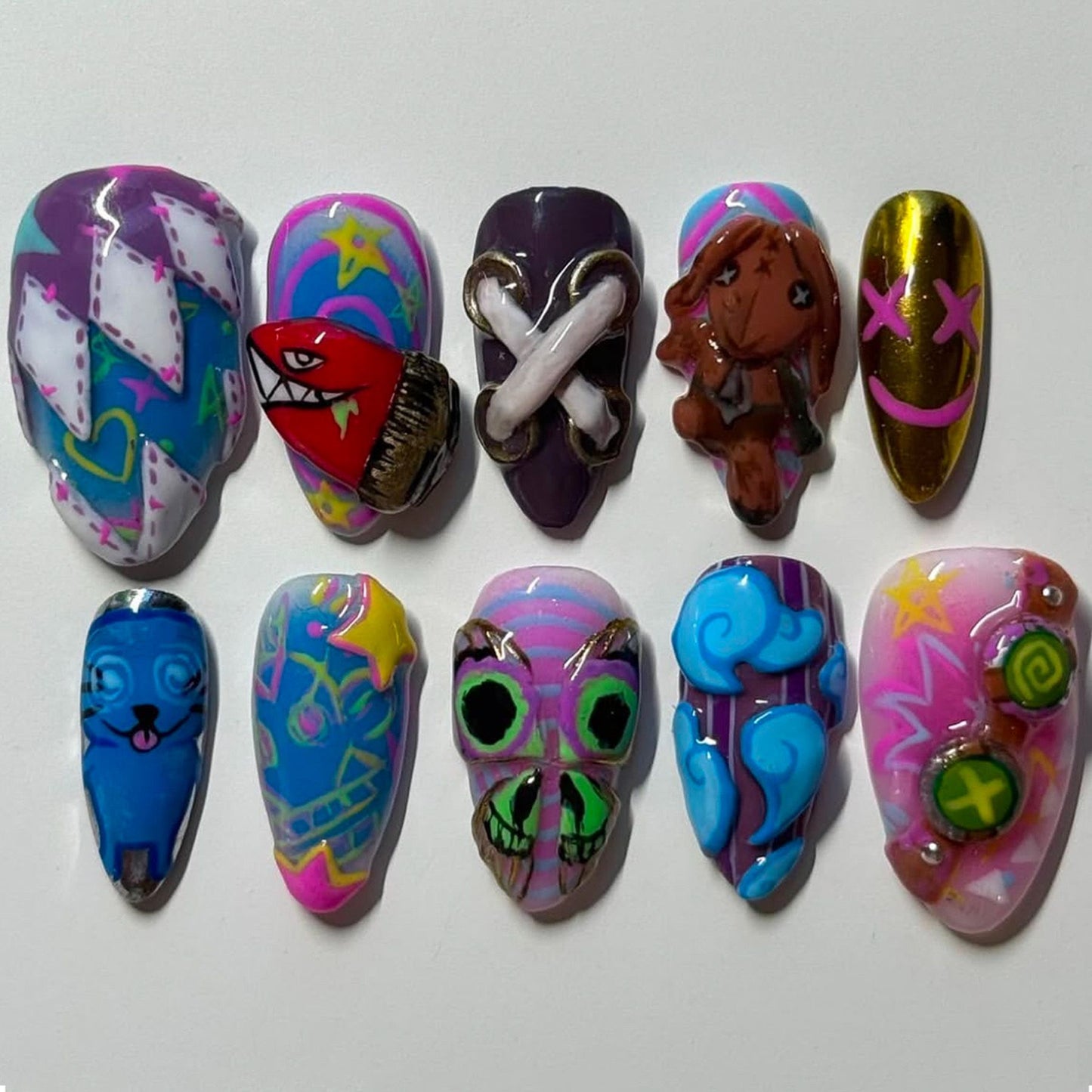Whimsical Fantasy Long Almond Shaped Multi-Colored Handmade Nail Set Featuring Unique Artistic Designs