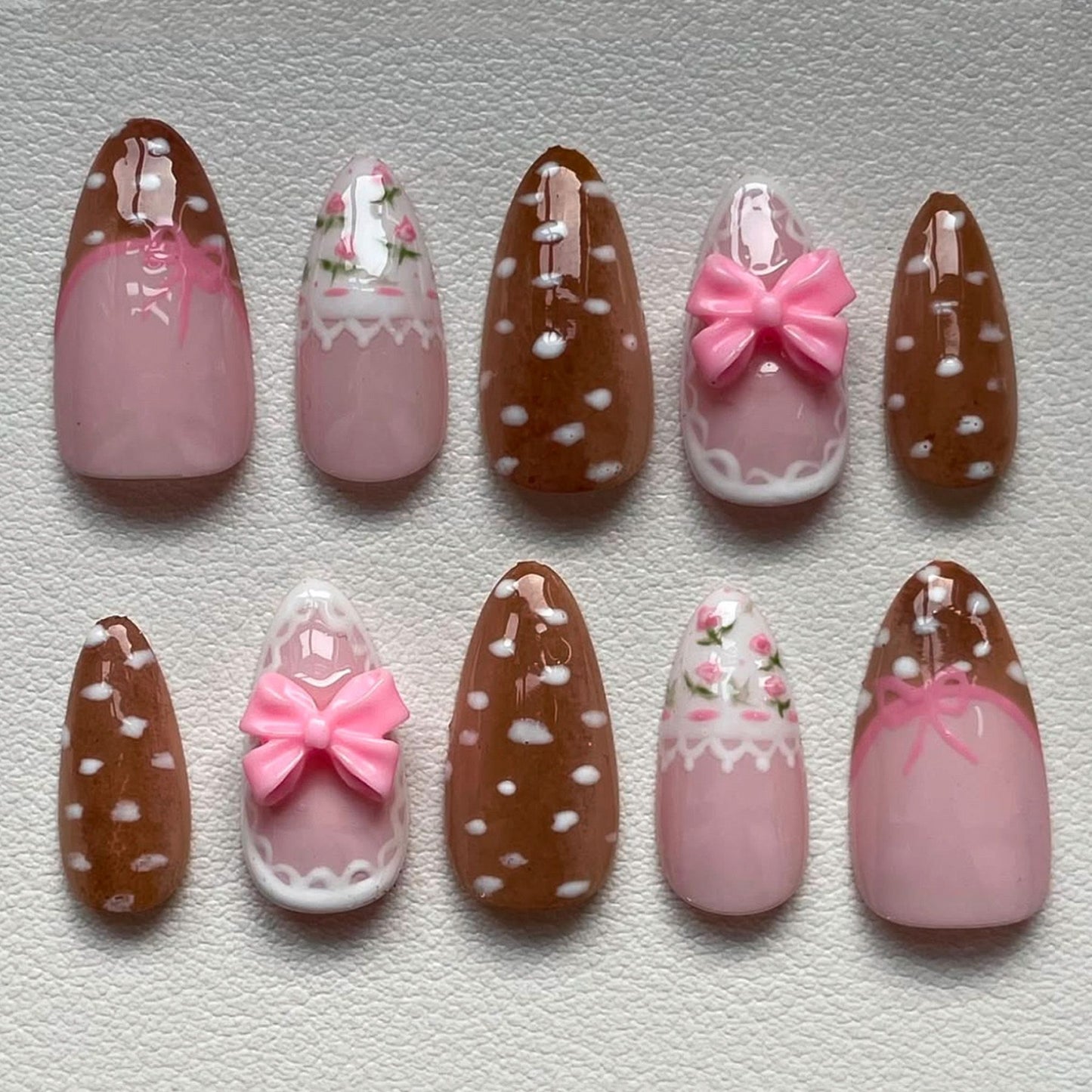 Sweet Treats Charming Long Almond and Stiletto Pink and Brown Nail Set with Lovely Bow Accents