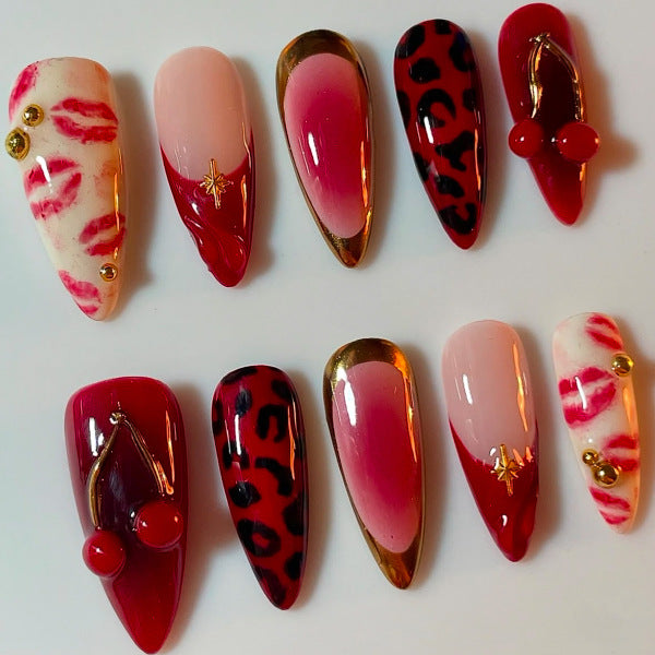 Chic Elegance Long Almond Red and Pink Gradient Press On Nail Set with Unique Gold Accents and Fun Print Design