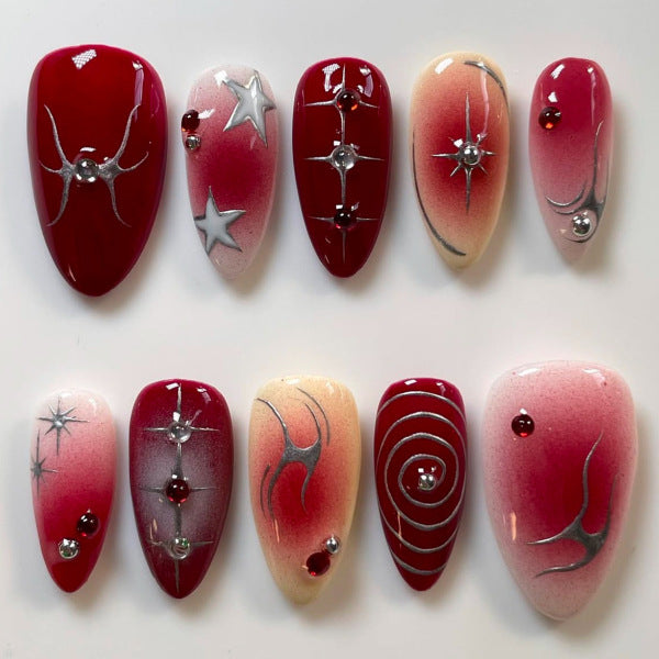 Glamorous Galaxy Press-On Nail Set Long Almond Red with Metallic Accents and Sparkling Gems
