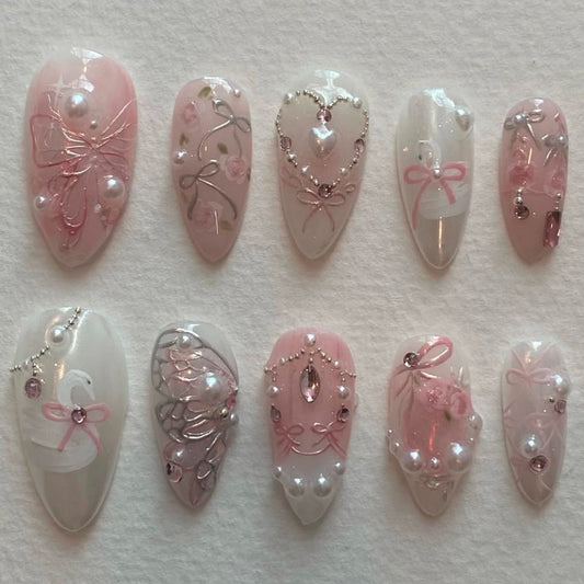 Fairy Tale Elegance Pink Long Almond Press On Nail Set with Pearls and Intricate Designs