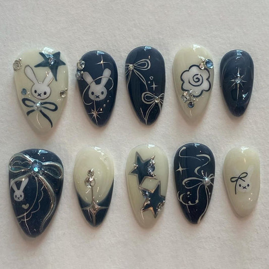 Charming Whimsy Short Almond Navy and Cream Press On Nail Set with Enchanting Bunny and Star Accents