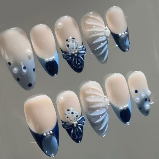 Nautical Elegance Long Almond Shaped Cream and Navy Press On Nail Set with Pearl Accents and Unique Bow Detail