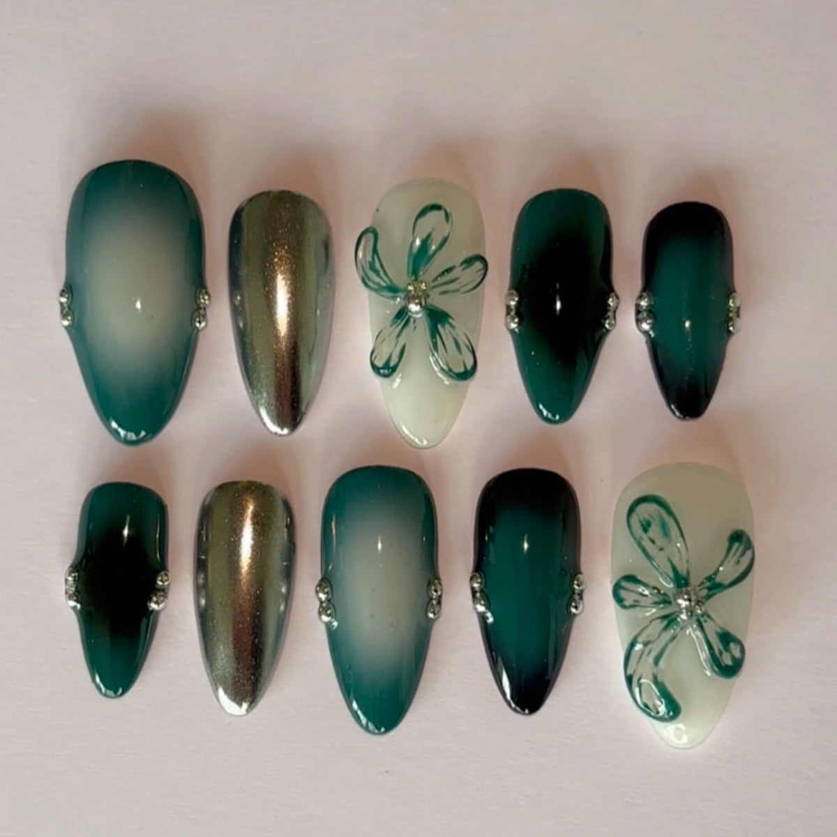 Ocean Breeze Elegance Long Almond Shaped Teal Ombre Press-on Nail Set with Floral Accents and Gemstone Detailing