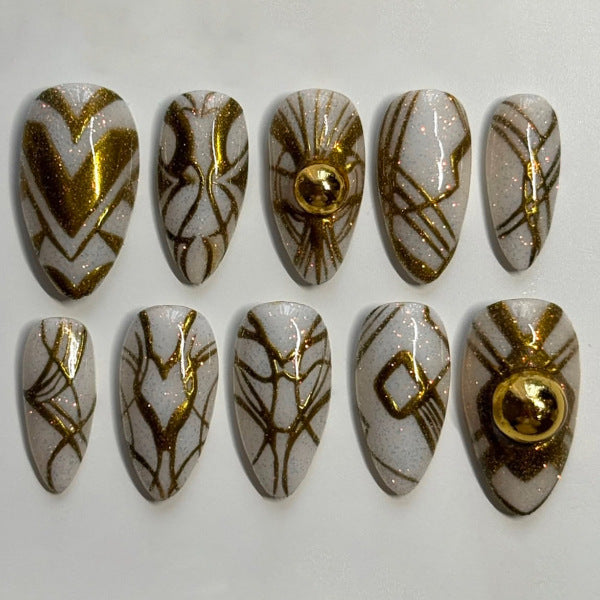 Glamorous Elegance Long Almond White and Gold Press On Nail Set with Shimmering Designs and Eye-Catching Gold Accents