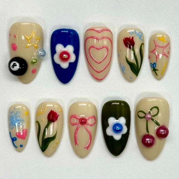 Cheerful Garden Themed Long Almond Shaped Colorful Press On Nail Set Featuring Charming Floral and Playful Design Elements