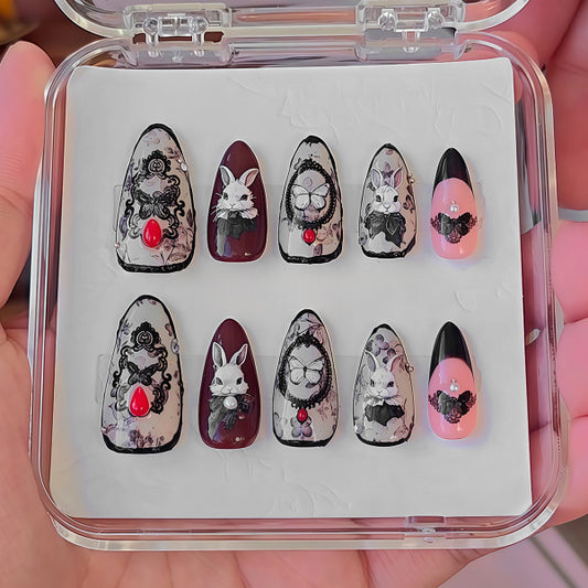 Whimsical Bunnies Press On Nail Set Long Almond Shape Black and Burgundy Color with Unique Floral and Bunny Embellishments