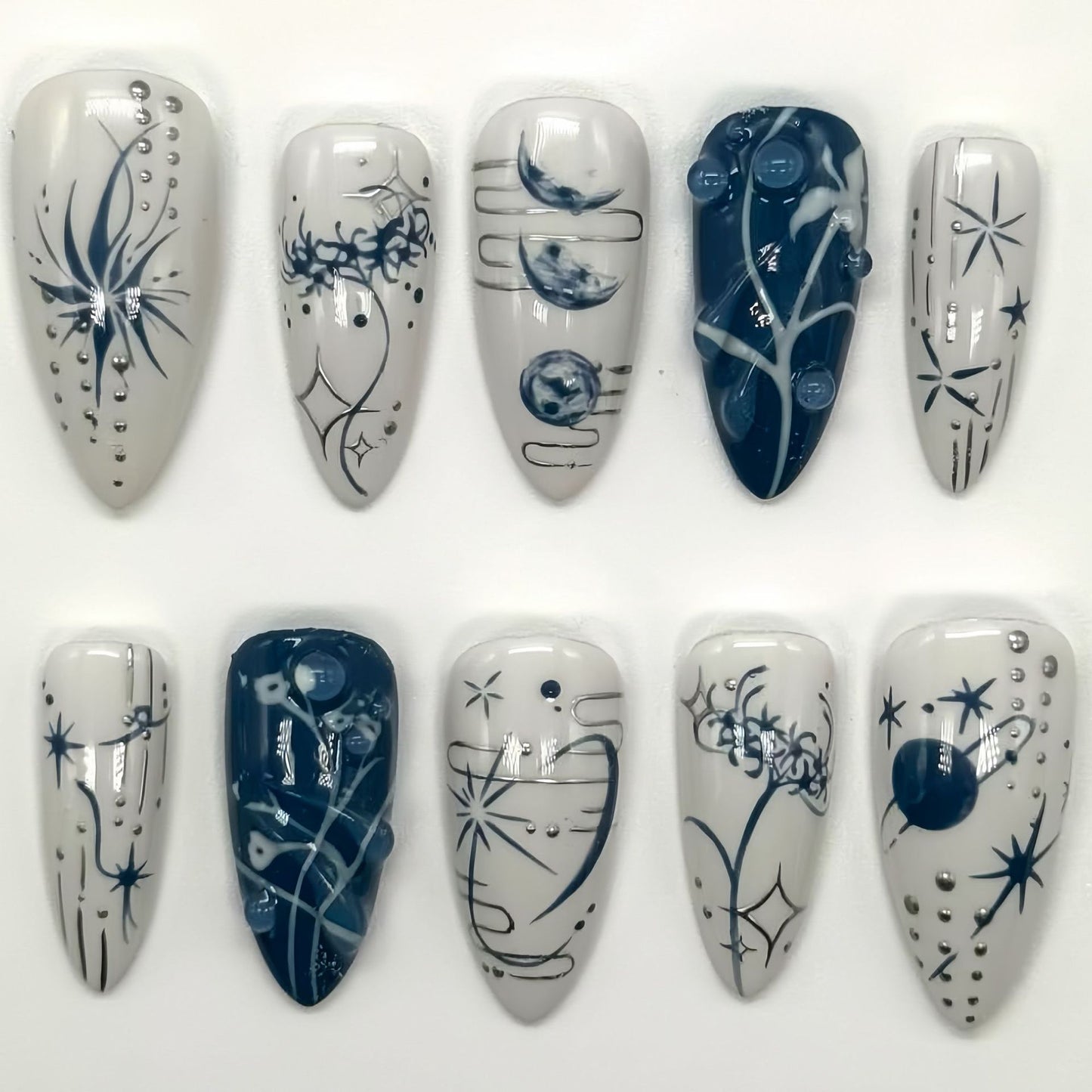 Celestial Elegance Long Almond Blue and White Press On Nail Set with Intricate Cosmic Designs