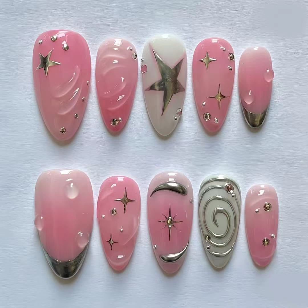 Celestial Dreamy Pink Long Almond Shaped Press-On Nail Set with Metallic Star Accents and Glossy Finish
