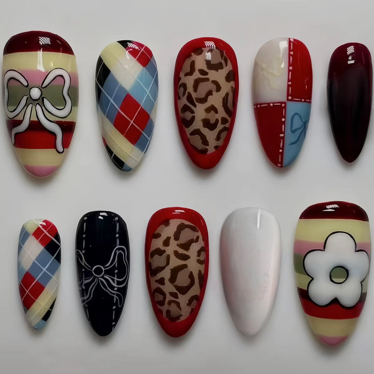 Chic Glamour Dreamy Long Almond Shaped Multicolored Nail Set with Unique Bow and Animal Print Designs