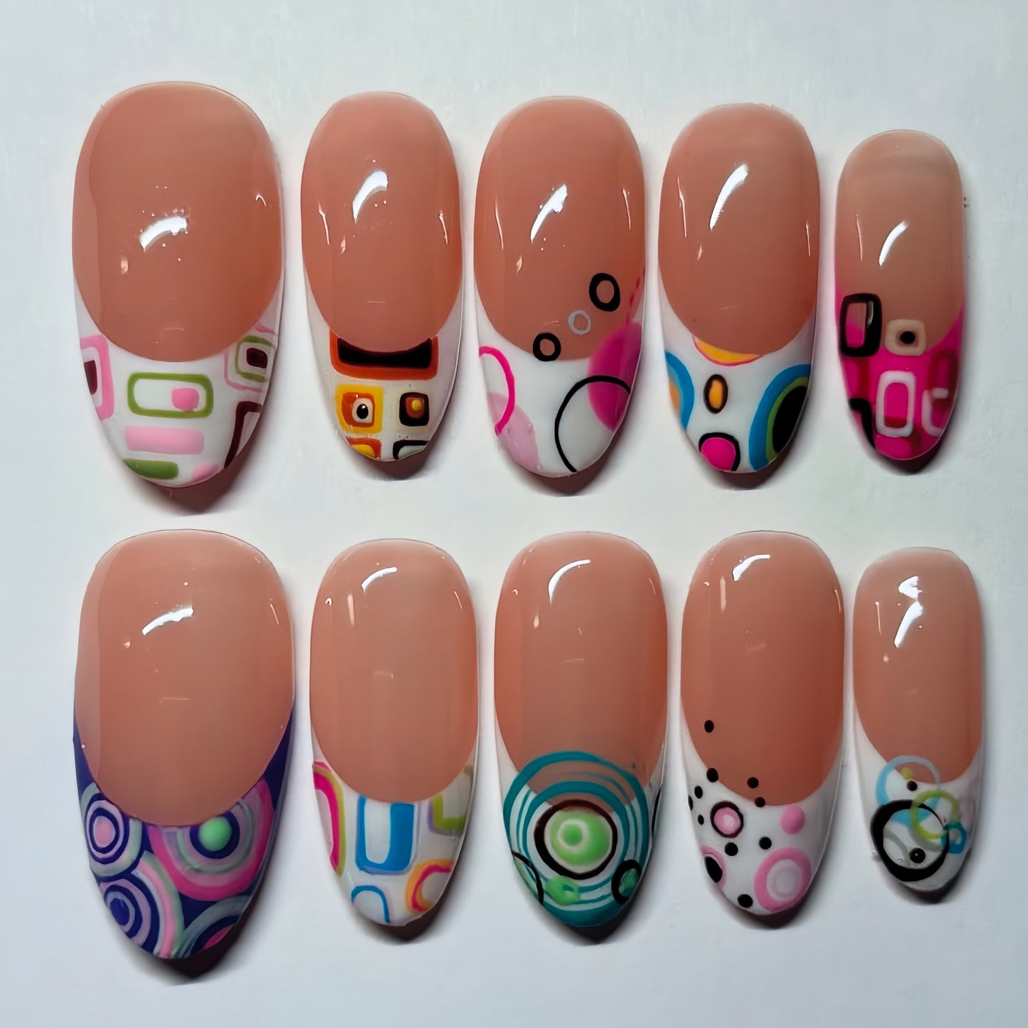 Geometric Chic Long Oval Pink Press On Nail Set with Colorful Circle Designs