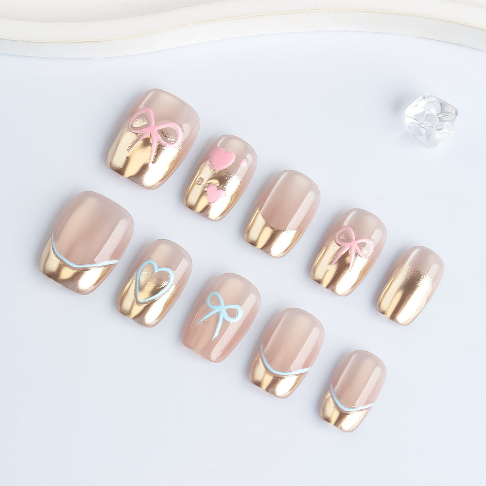 Whimsical Glamour Elegant Short Square Beige and Gold Press on Nail Set with Charming Bow and Heart Accents