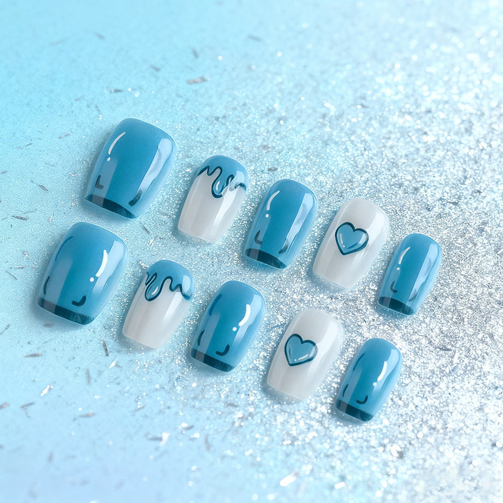 Ocean Wave Inspired Short Square Press On Nail Set Featuring Dripping Hearts and Vibrant Blue Color