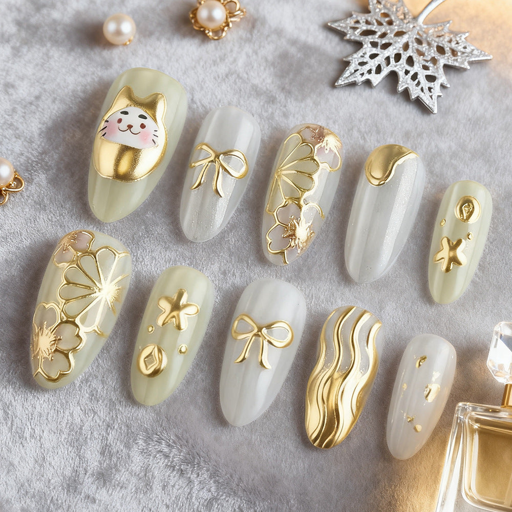 Whimsical Elegance Long Almond Green and White Press On Nail Set with Gold Metallic Accents and Unique Cat Design