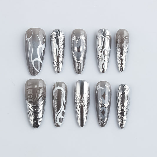 Mystical Fusion Press-On Nail Set Long Stiletto Shaped Metallic Silver with Unique Artistic Designs
