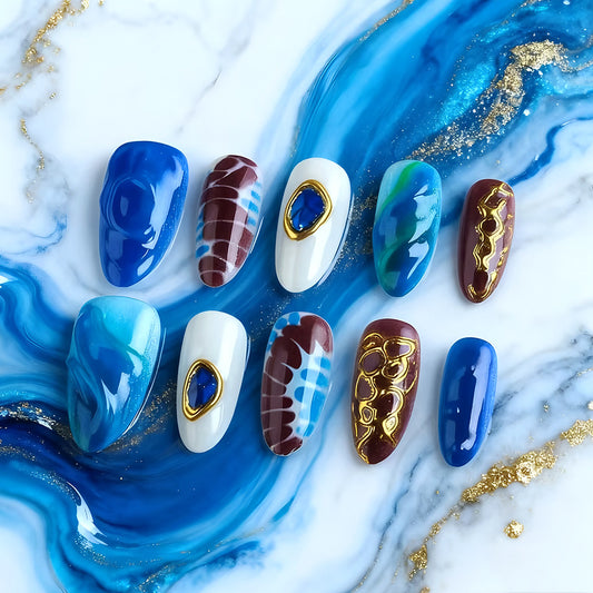 Oceanic Elegance Medium Almond Blue and Burgundy Marble Nails with Stunning Gold Accents