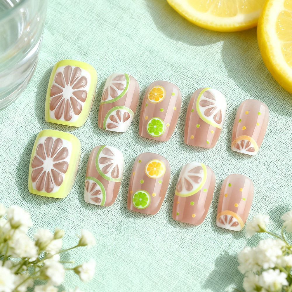 Citrus Delight Short Coffin Press On Nail Set in Pastel Pink Featuring Playful Fruit Designs