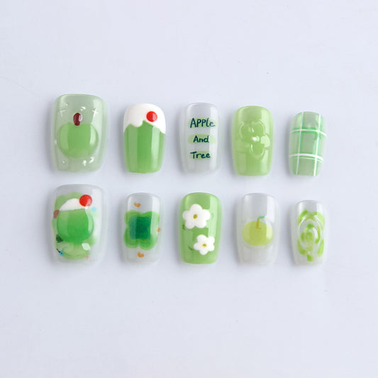 Garden Oasis Medium Square Green Press on Nail Set with Whimsical Fruit and Floral Designs