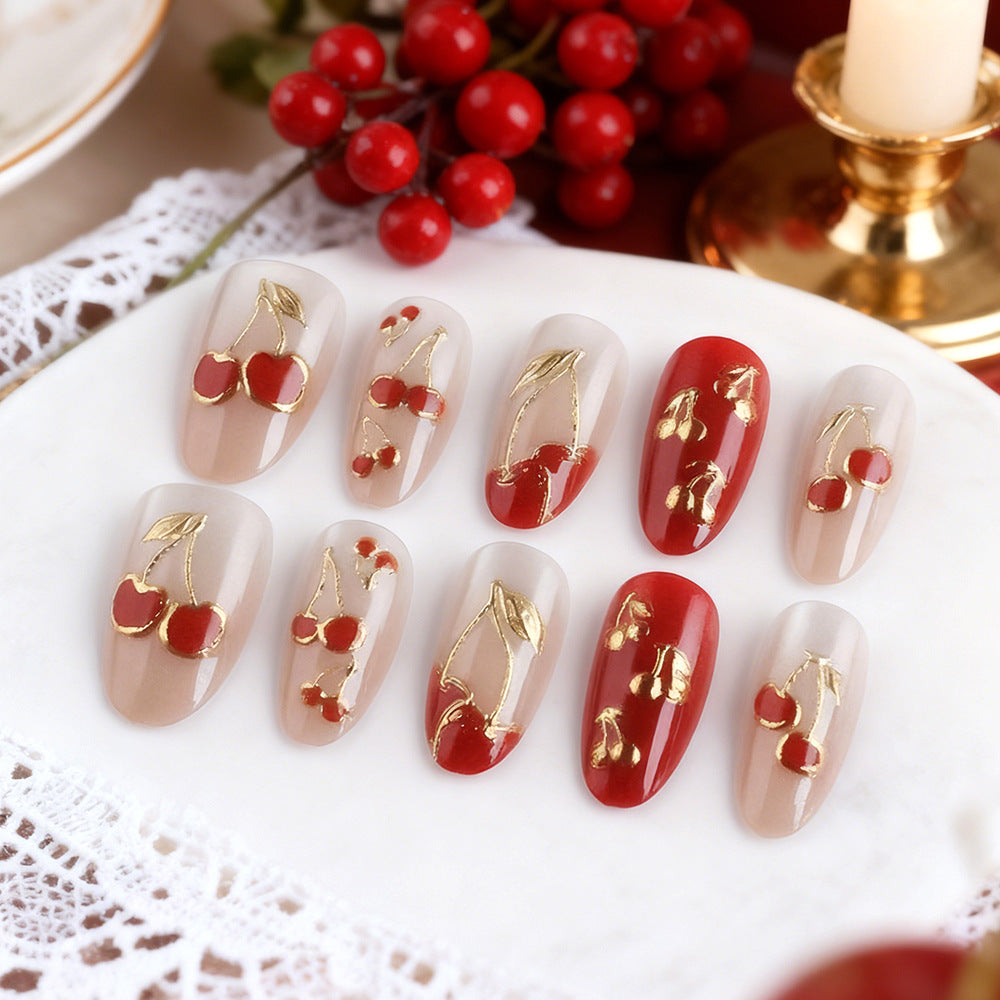 Cherry Blossom Delight Elegant Medium Almond Shaped Red and Clear Press on Nail Set with Gold Floral Accents